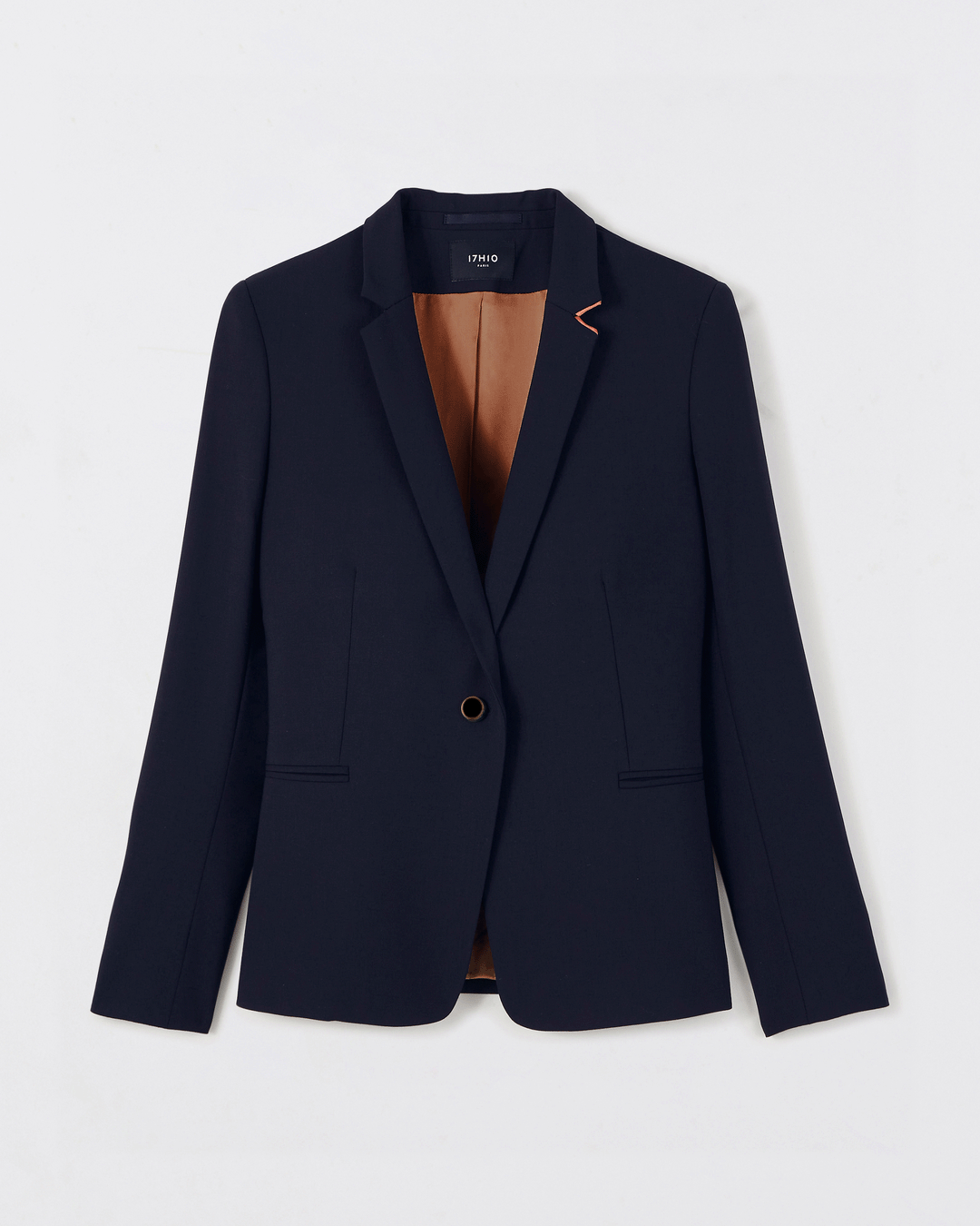 Tailleur femme pour le travail en bleu marine avec veste cintrée et pantalon large chic.